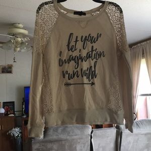Cream colored long sleeve shirt with lace